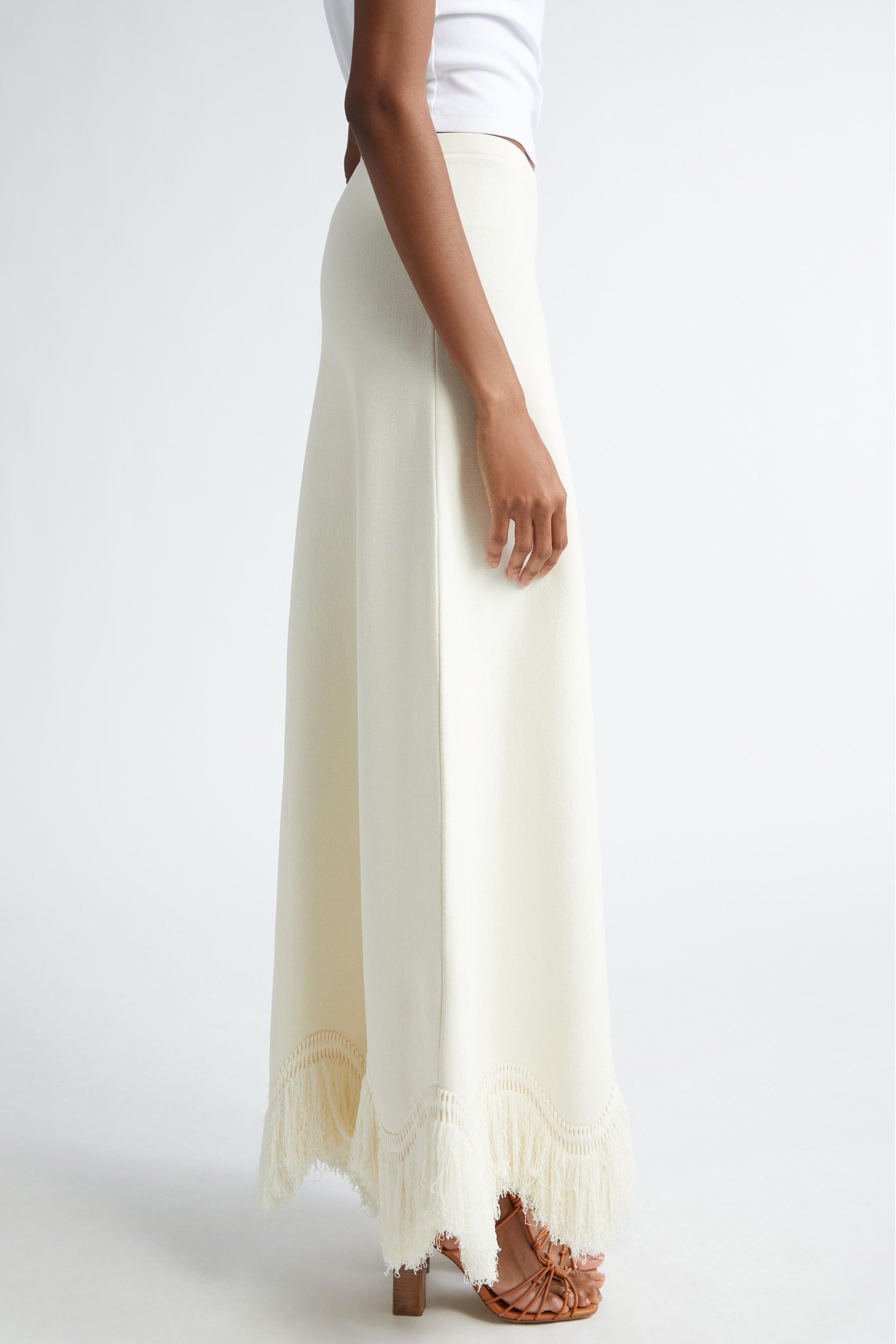 Solid Tassel Top & Mid Waist Tassel Skirt Set Solid Tassel Top & Mid Waist Tassel Skirt Set
